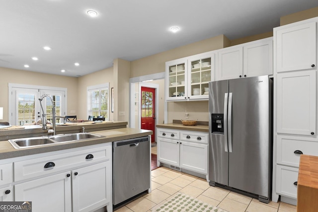 1261 Otter Slide Loop NE, Townsend, GA 31331 - kitchen featuring appliances with stainless steel finishes, a sink, white cabinetry, and recessed lighting