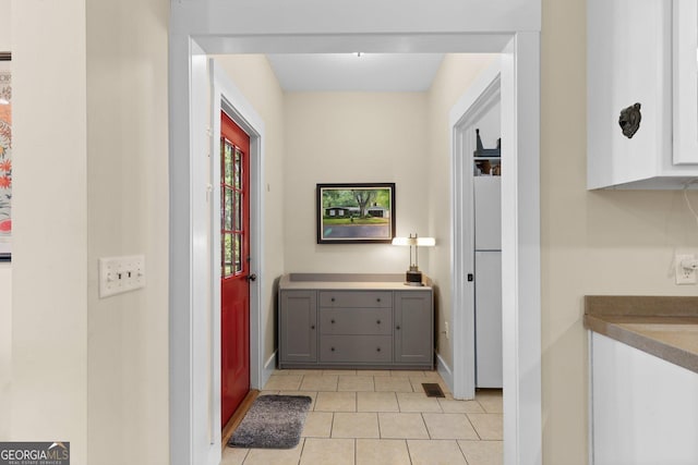 1261 Otter Slide Loop NE, Townsend, GA 31331 - hallway featuring light tile patterned floors and baseboards