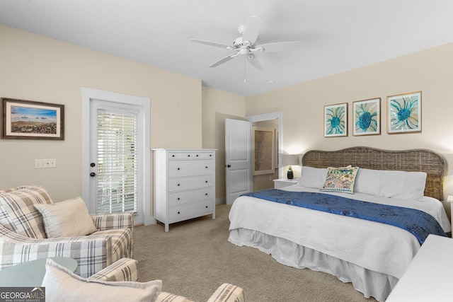 1261 Otter Slide Loop NE, Townsend, GA 31331 - bedroom with carpet floors, ceiling fan, and access to exterior