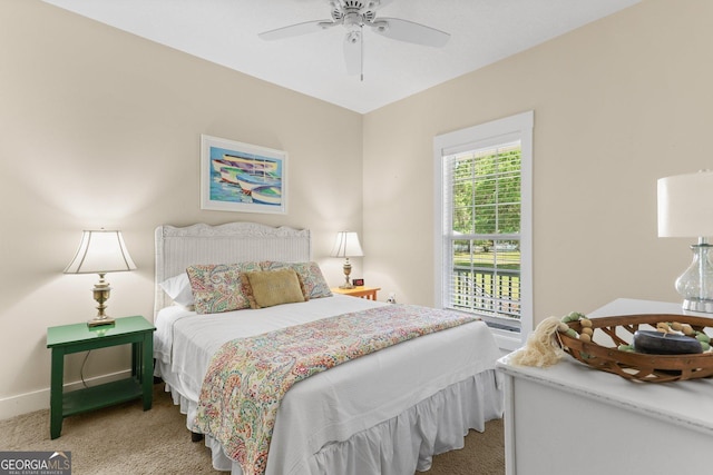 1261 Otter Slide Loop NE, Townsend, GA 31331 - bedroom with carpet floors, baseboards, and ceiling fan