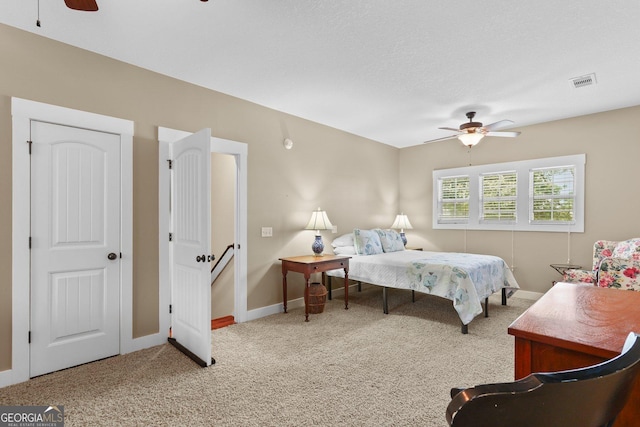 1261 Otter Slide Loop NE, Townsend, GA 31331 - bedroom featuring carpet floors, baseboards, and ceiling fan