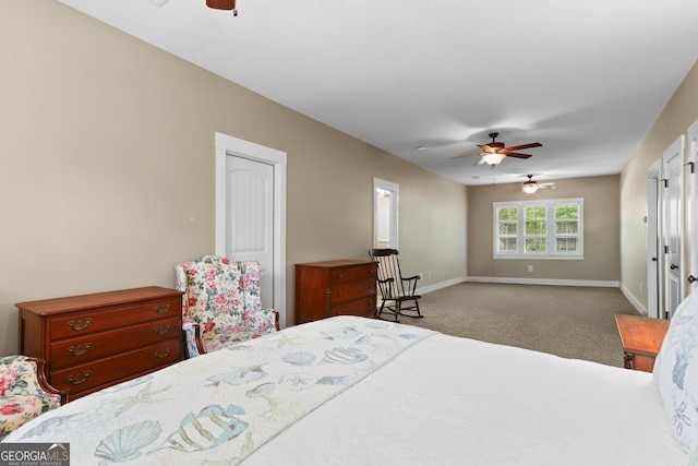 1261 Otter Slide Loop NE, Townsend, GA 31331 - bedroom with carpet floors, baseboards, and ceiling fan