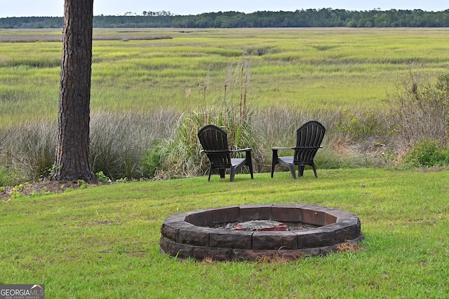 1261 Otter Slide Loop NE, Townsend, GA 31331 - view of yard with a fire pit and a rural view