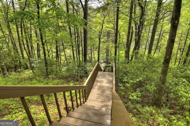 view of home's community with a forest view