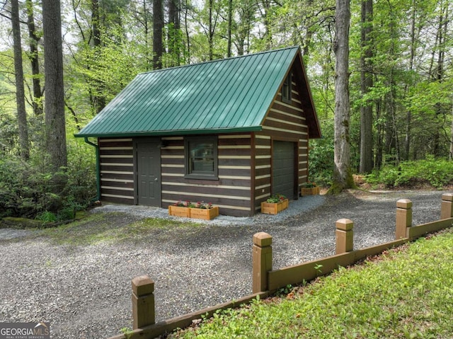 view of outbuilding featuring an outdoor structure