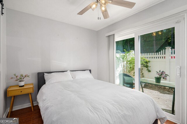 2716 Suwanee Way SE, Marietta, GA 30067 - bedroom featuring baseboards, ceiling fan, and wood finished floors