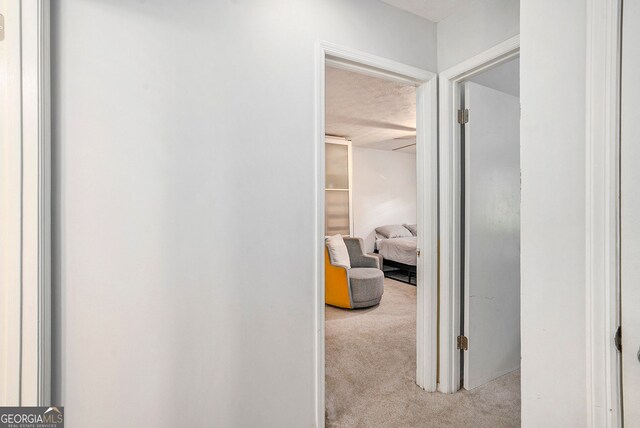 2716 Suwanee Way SE, Marietta, GA 30067 - hall featuring a textured ceiling and carpet