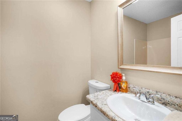 196 Highland Dr, Calhoun, GA 30701 - bathroom with vanity and toilet