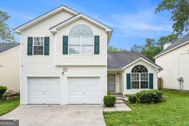 2722 S Hills, Riverdale, GA 30296 - traditional-style house with a front lawn, driveway, and a garage