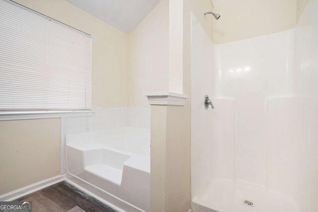 2722 S Hills, Riverdale, GA 30296 - bathroom with a shower stall, a bath, and wood finished floors