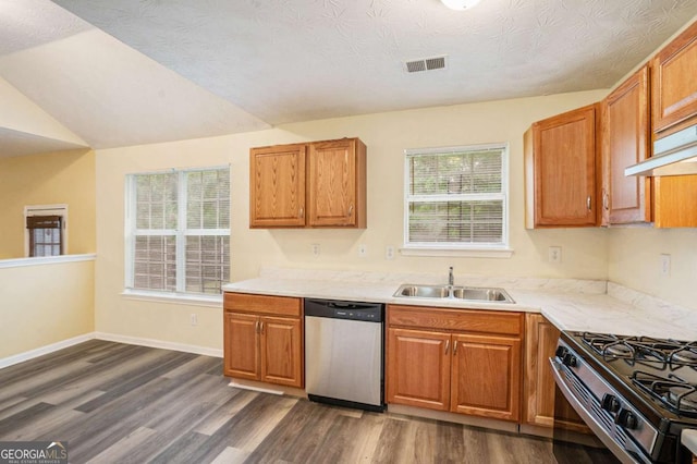 2722 S Hills, Riverdale, GA 30296 - kitchen featuring stainless steel dishwasher, dark wood finished floors, visible vents, a sink, and light countertops