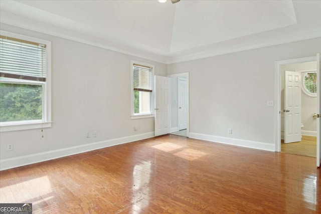 unfurnished bedroom featuring baseboards and wood finished floors