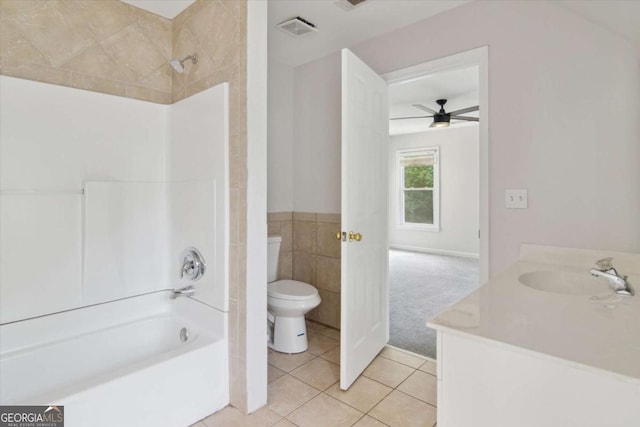 full bathroom featuring toilet, a ceiling fan, shower / tub combination, visible vents, and tile patterned flooring