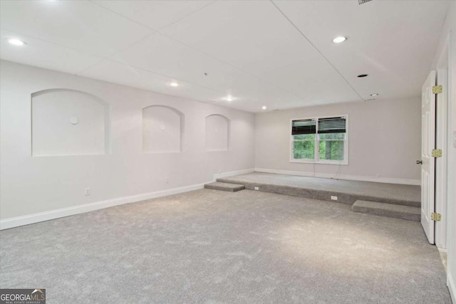 carpeted spare room with baseboards and recessed lighting