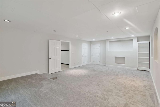 interior space featuring carpet, baseboards, and recessed lighting
