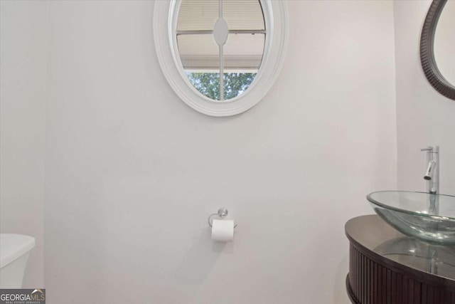 bathroom with a sink and toilet