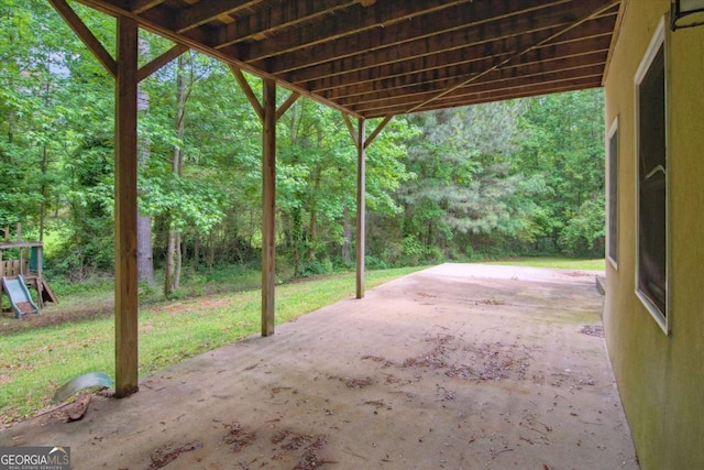 view of patio featuring a wooded view