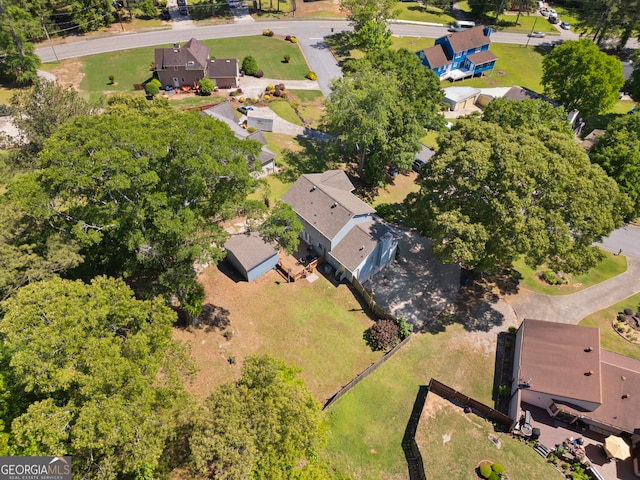 aerial overview of property's location featuring nearby suburban area