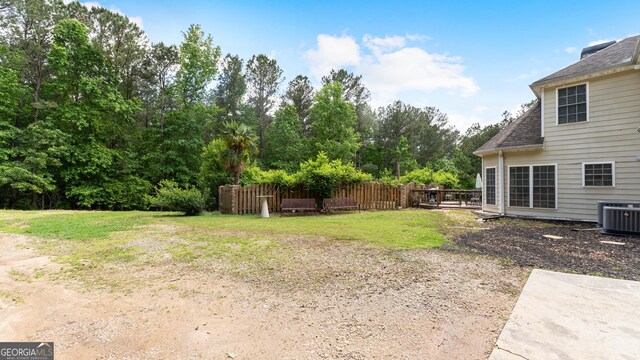 11440 Azalea Trl, Hampton, GA 30228 - view of yard with fence, central AC, and a deck
