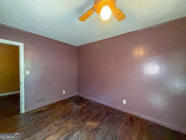 668 Lynn Cir SW, Atlanta, GA 30311 - spare room featuring ceiling fan, baseboards, and wood finished floors