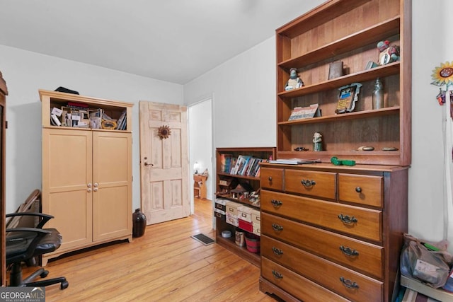 office space featuring light wood-style floors