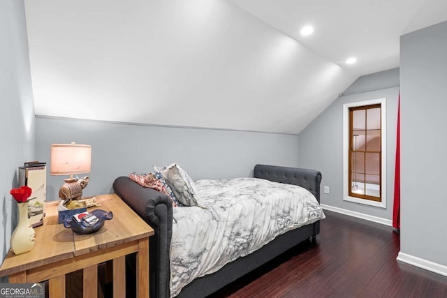 bedroom with vaulted ceiling, wood-type flooring, baseboards, and recessed lighting