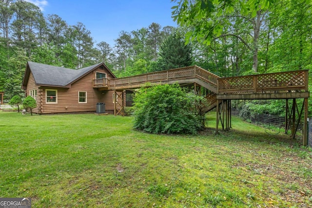 back of house featuring cooling unit, stairway, a deck, a yard, and log exterior
