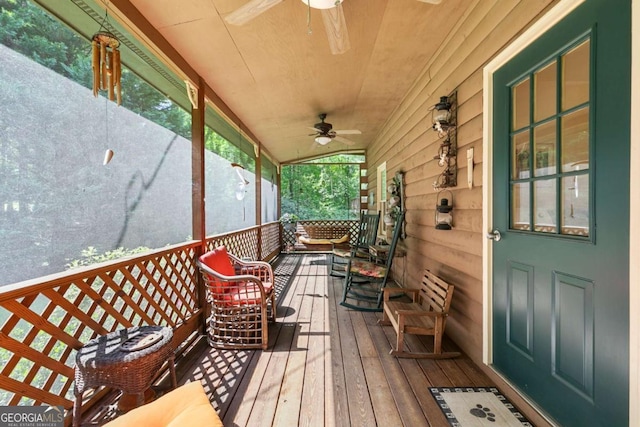 16335 Henderson Rd, Milton, GA 30004 - wooden deck featuring a ceiling fan and covered porch