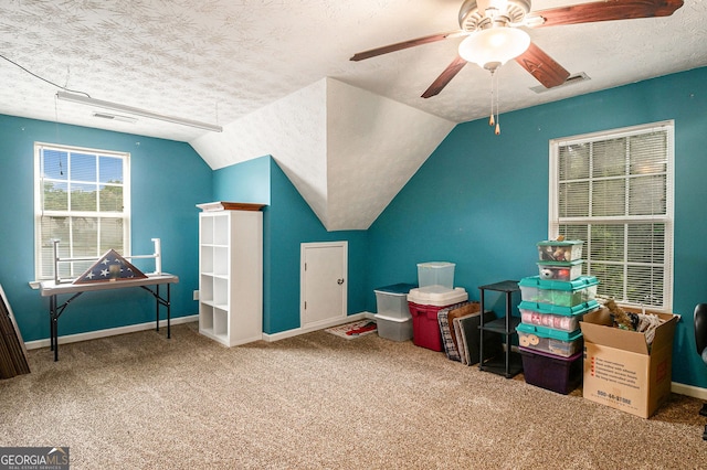 1071 Wildflower Way, Madison, GA 30650 - bonus room featuring a ceiling fan, carpet flooring, baseboards, a textured ceiling, and lofted ceiling