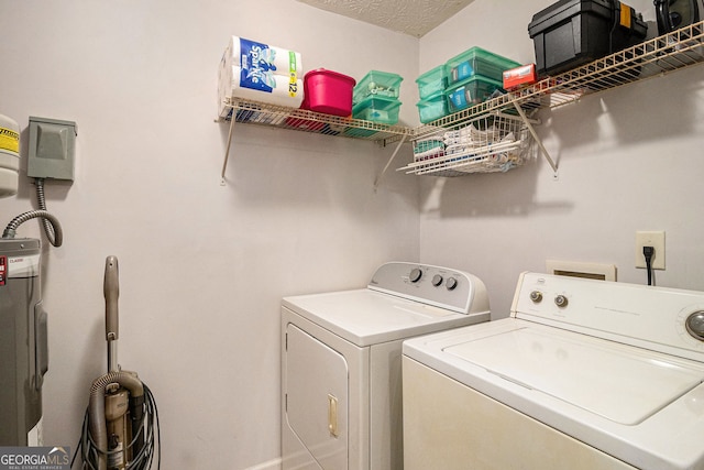 1071 Wildflower Way, Madison, GA 30650 - laundry room featuring separate washer and dryer and water heater