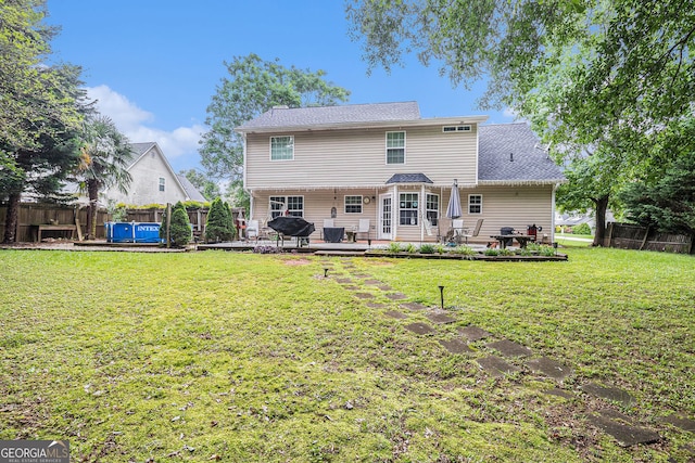 1071 Wildflower Way, Madison, GA 30650 - rear view of property featuring a patio