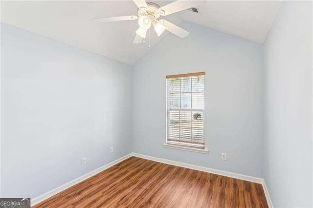 334 Hunterian Pl, Newnan, GA 30265 - unfurnished room featuring baseboards, vaulted ceiling, ceiling fan, and wood finished floors