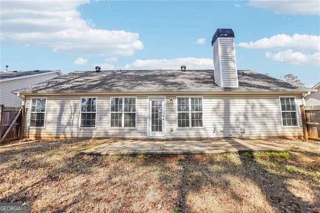 334 Hunterian Pl, Newnan, GA 30265 - back of house featuring a patio area, a chimney, and fence