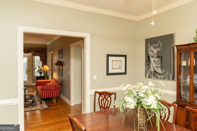 17 Hampton Way, Carrollton, GA 30116 - dining area with wood finished floors and ornamental molding