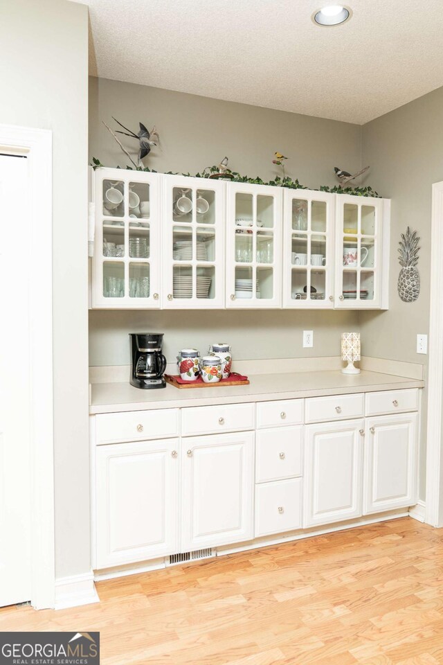 17 Hampton Way, Carrollton, GA 30116 - bar featuring light wood-style floors and recessed lighting
