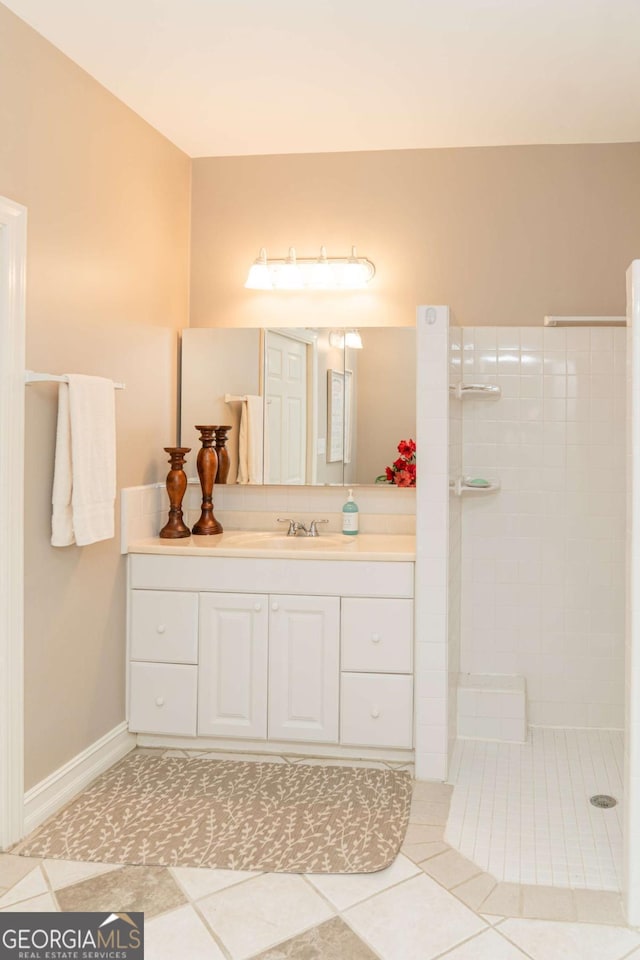 17 Hampton Way, Carrollton, GA 30116 - full bathroom with vanity, tile patterned flooring, and a tile shower