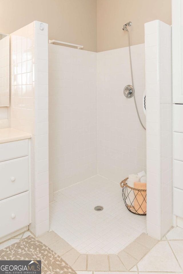 17 Hampton Way, Carrollton, GA 30116 - full bath with vanity, tiled shower, and tile patterned flooring