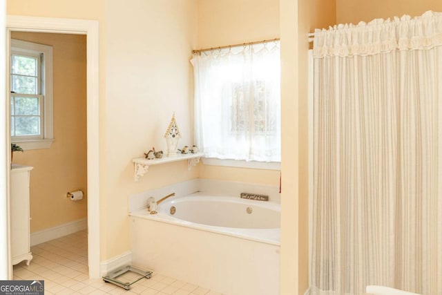 17 Hampton Way, Carrollton, GA 30116 - bathroom with tile patterned flooring, baseboards, and a bath