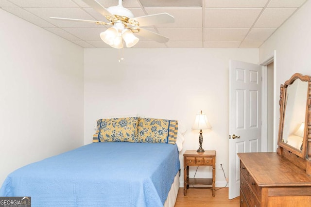 17 Hampton Way, Carrollton, GA 30116 - bedroom featuring light wood-style floors, a ceiling fan, and a paneled ceiling