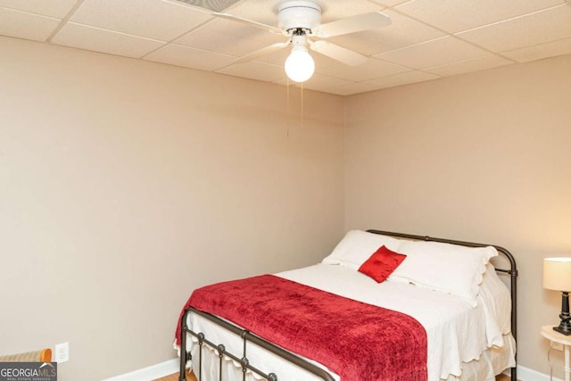 17 Hampton Way, Carrollton, GA 30116 - bedroom featuring a paneled ceiling, baseboards, a ceiling fan, and wood finished floors