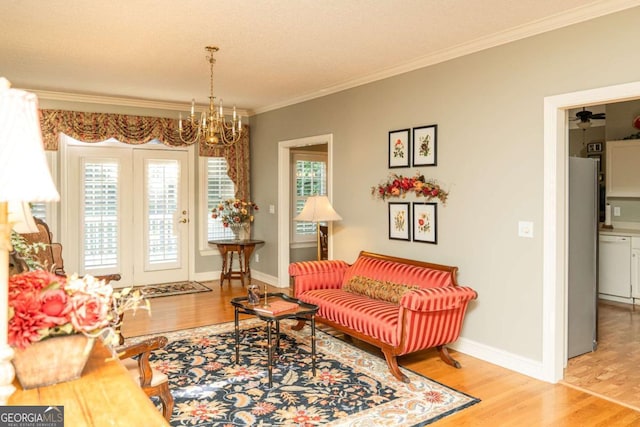 17 Hampton Way, Carrollton, GA 30116 - sitting room featuring baseboards, ornamental molding, a chandelier, and wood finished floors