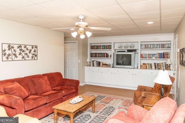 17 Hampton Way, Carrollton, GA 30116 - living area with light wood-style floors, built in features, a ceiling fan, and recessed lighting