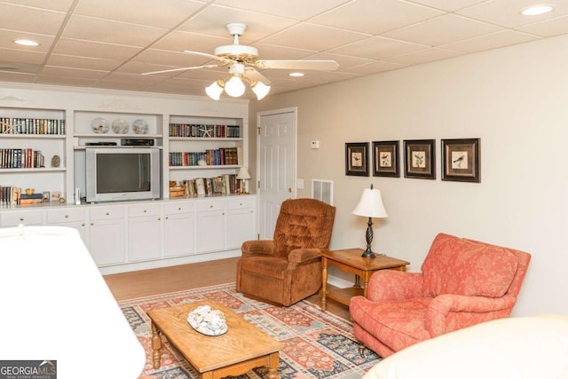 17 Hampton Way, Carrollton, GA 30116 - living area with ceiling fan, recessed lighting, built in shelves, and light wood-type flooring