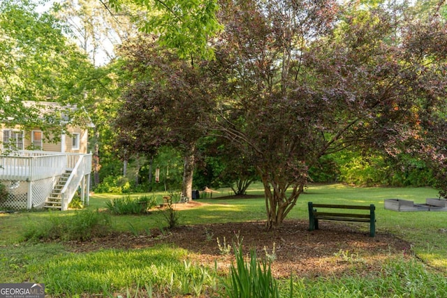 17 Hampton Way, Carrollton, GA 30116 - view of home's community featuring a yard, a wooden deck, and stairway