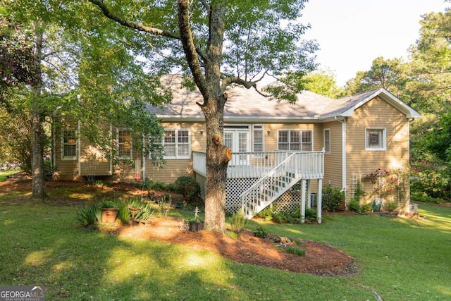 17 Hampton Way, Carrollton, GA 30116 - rear view of house with a lawn, a deck, and stairs