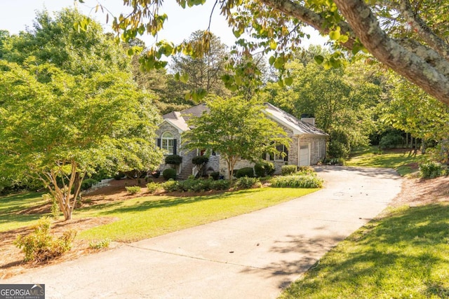17 Hampton Way, Carrollton, GA 30116 - obstructed view of property with a front lawn and driveway