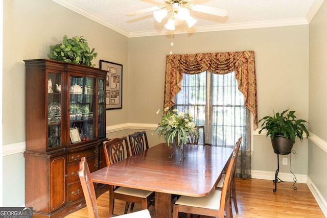 17 Hampton Way, Carrollton, GA 30116 - dining room featuring ornamental molding, light wood-style flooring, baseboards, and ceiling fan