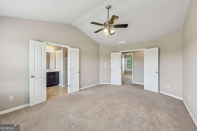 1257 Park Pass Way, Suwanee, GA 30024 - unfurnished bedroom with vaulted ceiling, light colored carpet, and baseboards