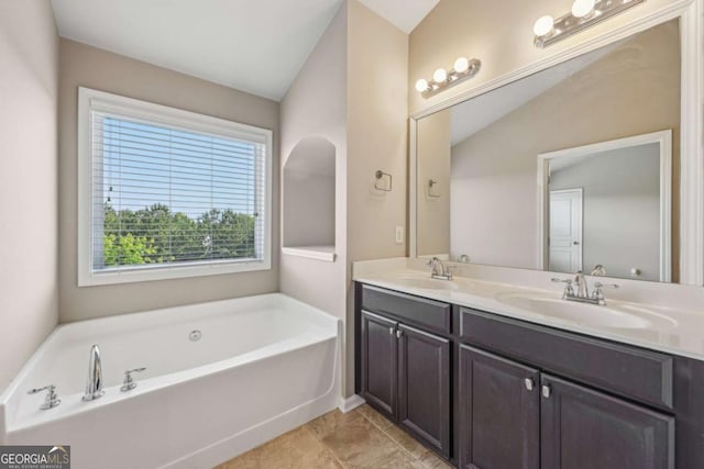 1257 Park Pass Way, Suwanee, GA 30024 - bathroom featuring a bath, double vanity, and a sink