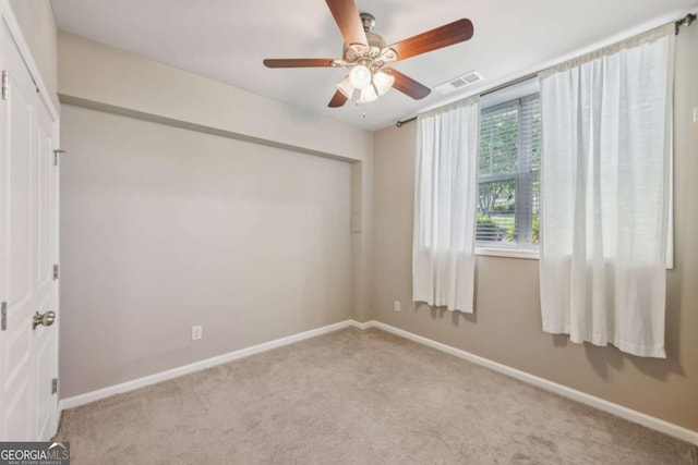 1257 Park Pass Way, Suwanee, GA 30024 - unfurnished bedroom featuring carpet, a ceiling fan, a closet, visible vents, and baseboards